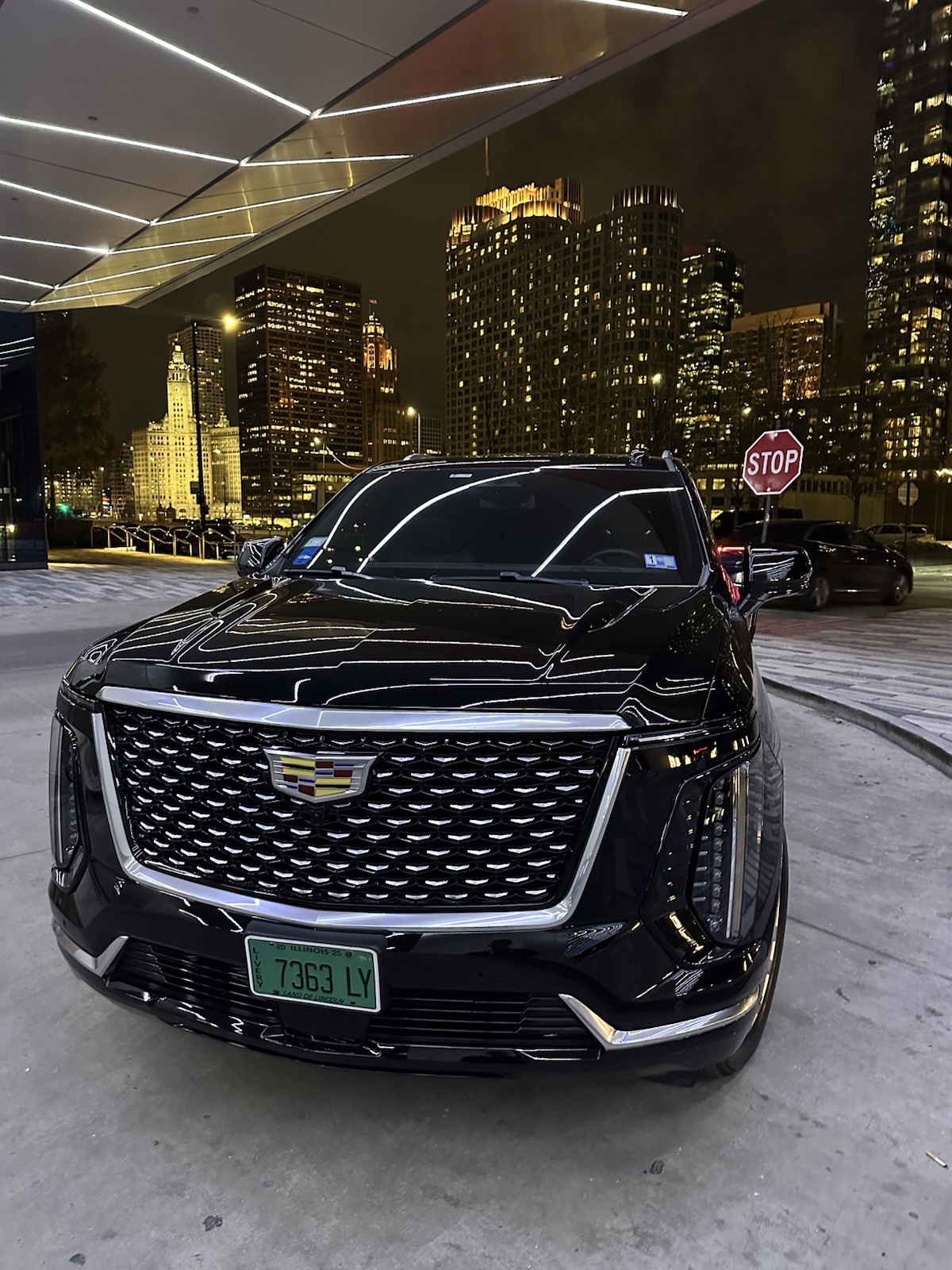 Contact Limo SUV downtown Chicago at night — hourly as-directed charter service