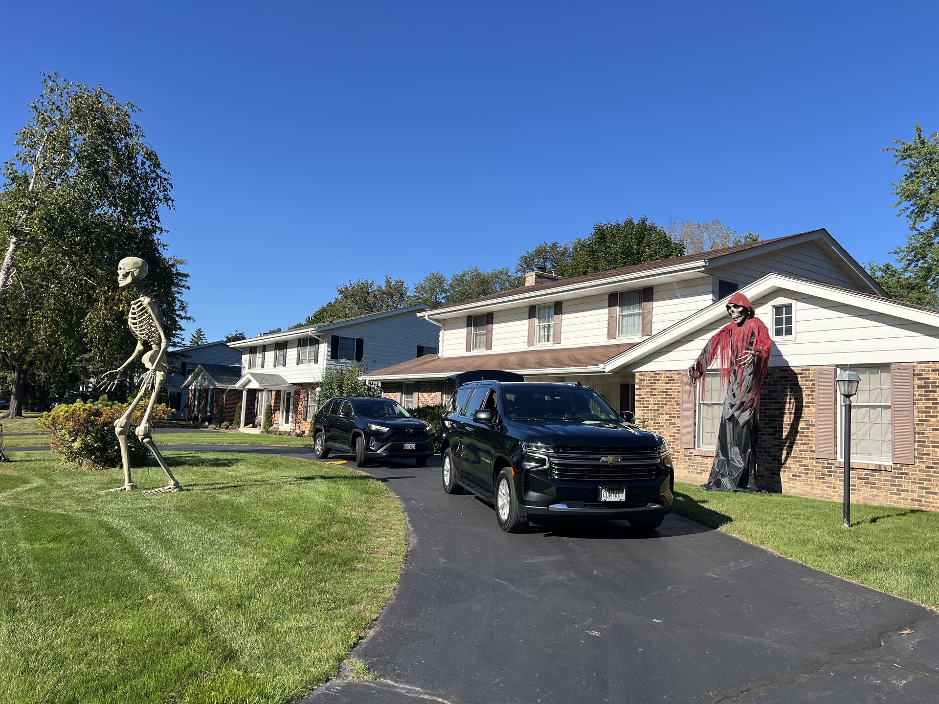 Contact Limo luxury SUV at residential home pickup — chauffeur service Kenosha to Milwaukee area