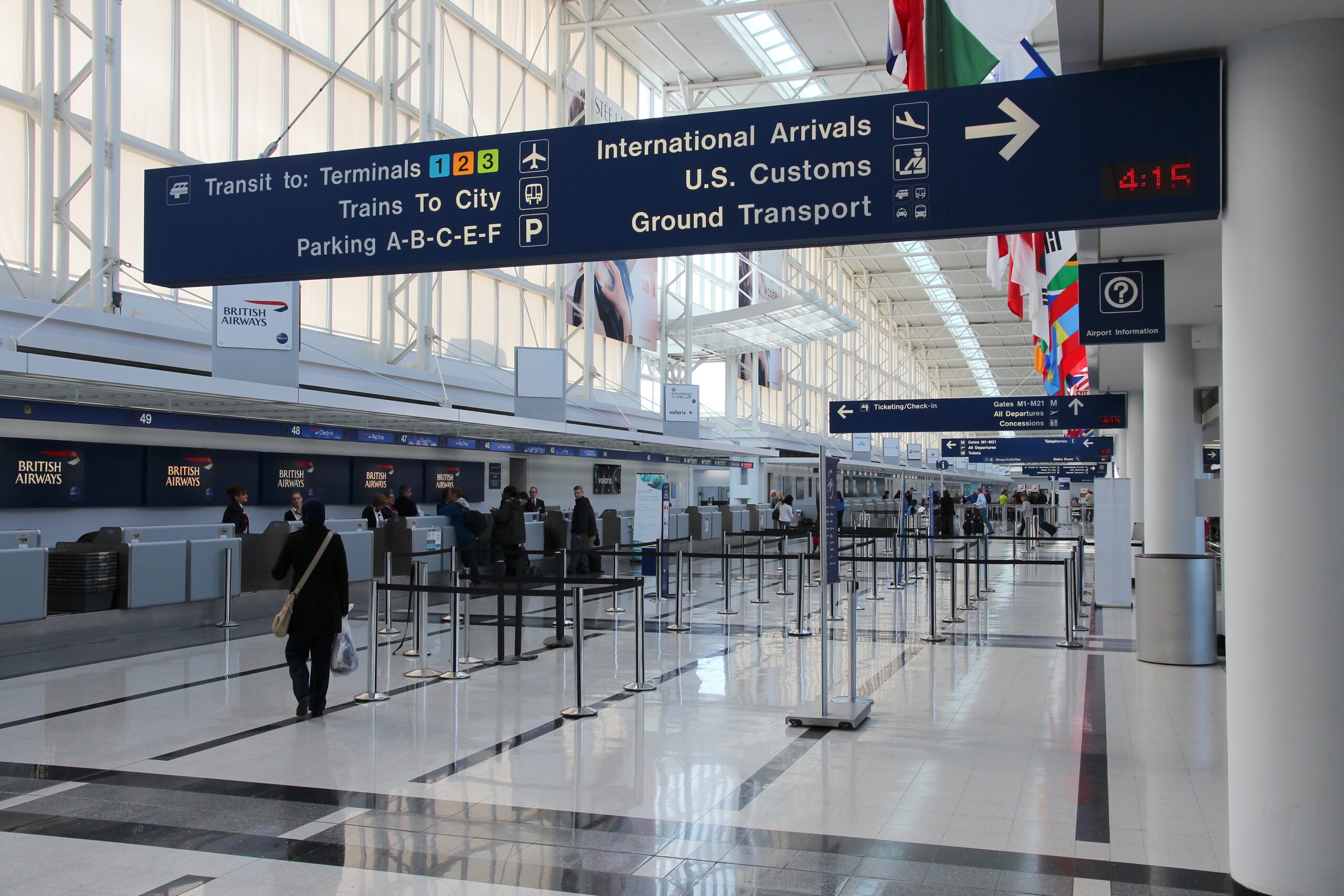 O'Hare International Airport arrivals terminal — ground transport and customs signage