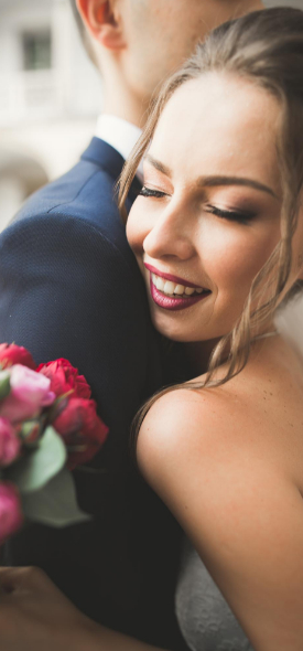 Wedding couple with bouquet arriving in Contact Limo luxury SUV — Wisconsin wedding transportation