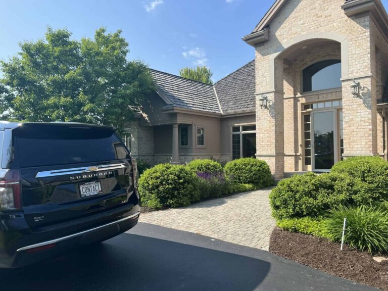 Contact Limo Suburban parked in a residential driveway for a morning pickup